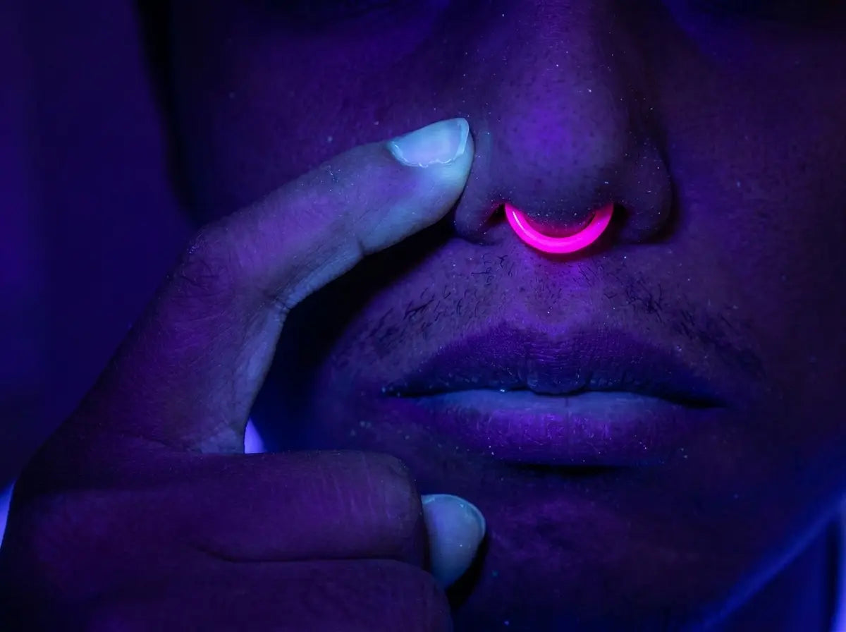 A pink ring glowing under blacklight